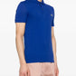 Lacoste
logo-patch cotton polo shirt